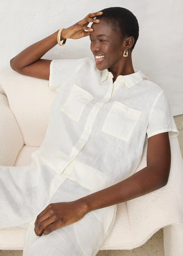 Wijde blouse met korte mouwen van puur linnen • wolwit • product-page.page-title-suffix