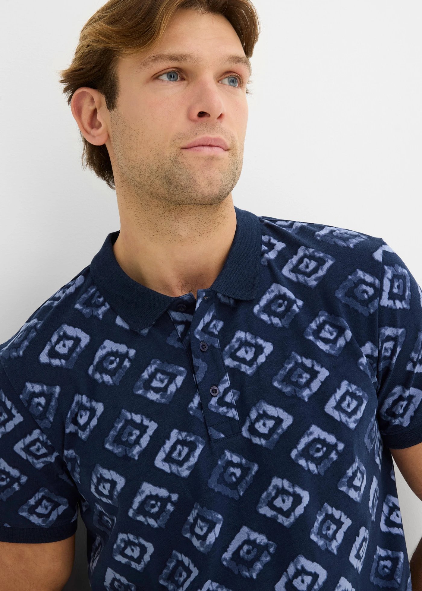 Polo slim en jersey • bleu foncé imprimé • Boutique bonprix