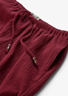 Pantaloni largi din material cu efect structurat • roșu rubiniu • magazin bonprix