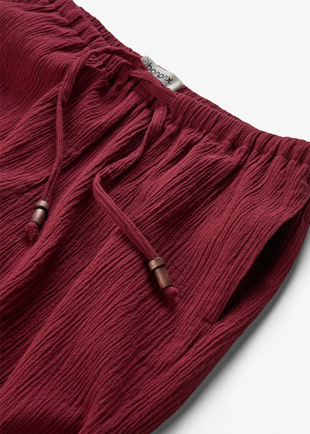 Wijde broek van gestructureerde crinkle • robijnrood • product-page.page-title-suffix