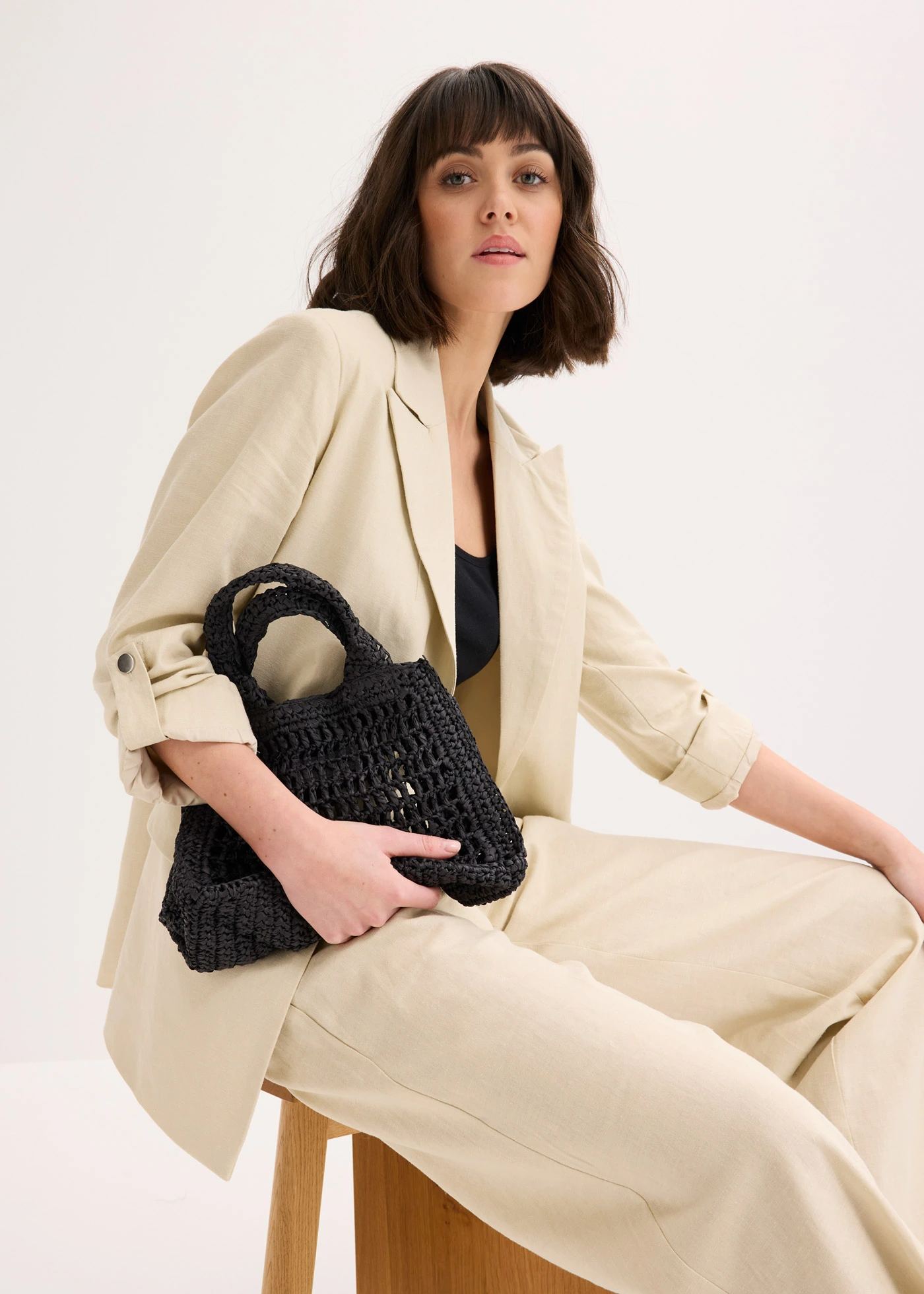 Sac à bandoulière aspect paille • noir • Boutique bonprix