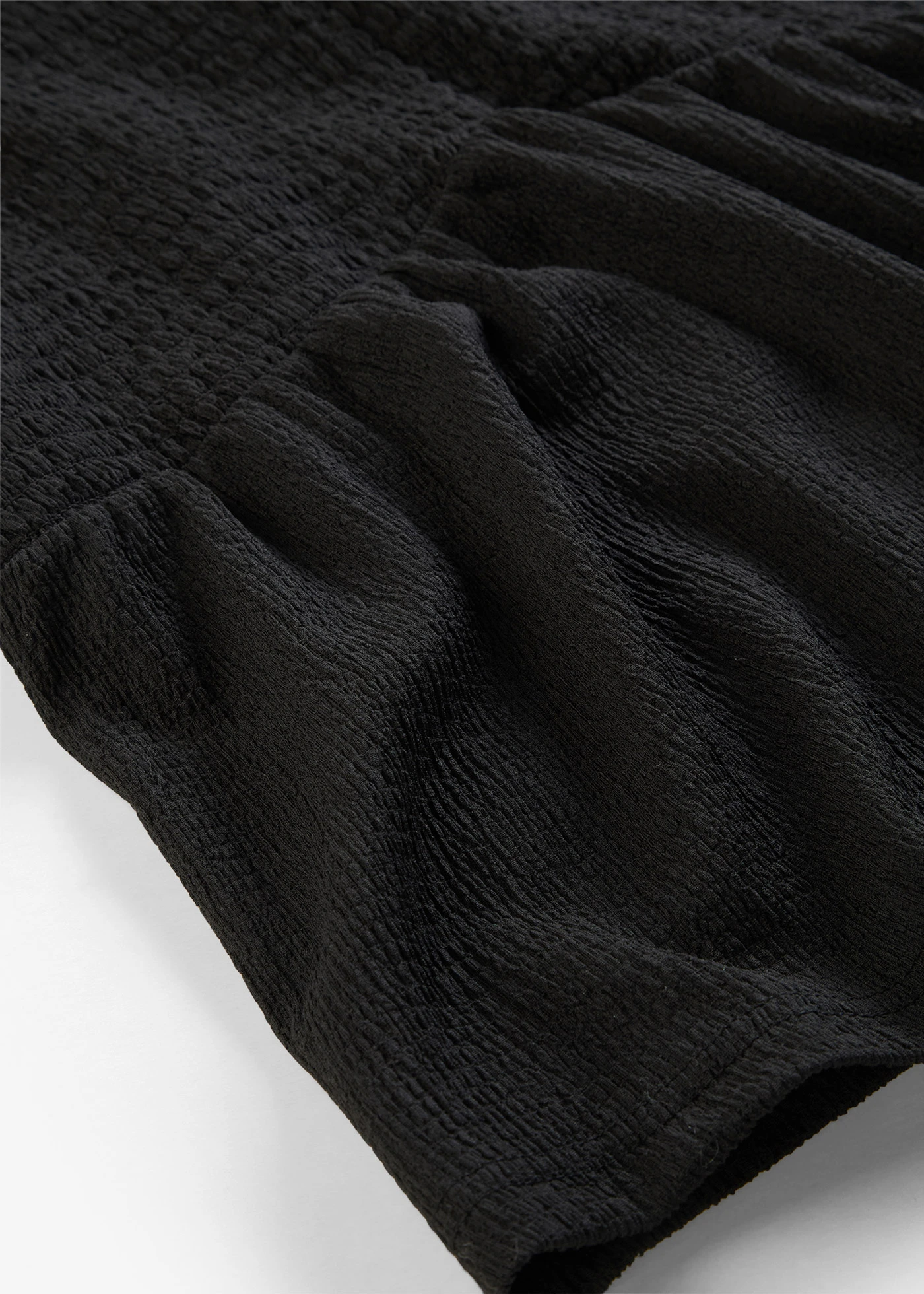 Bluză tricot din crep structurat • negru • magazin bonprix