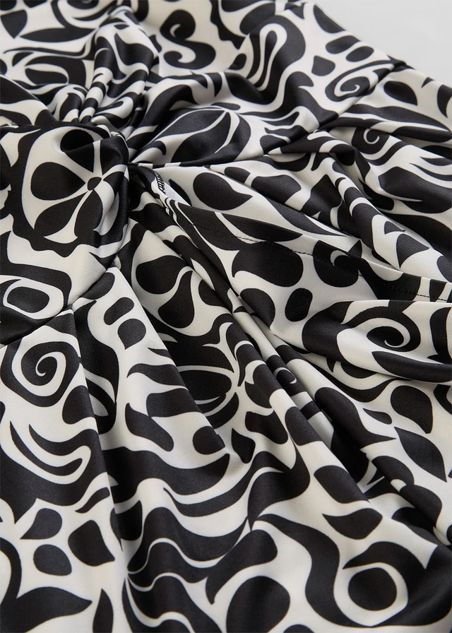 Mini jurk met een diep decolleté • parelwit-zwart gebloemd • product-page.page-title-suffix
