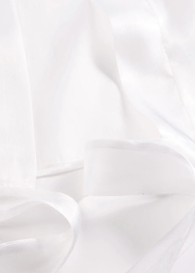 Boléro en tulle fin avec détail à nouer • écru • product-page.page-title-suffix