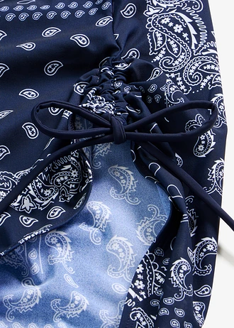 Costum de baie shape cu efect modelator ușor și încrețituri laterale • bleumarin- alb, cu imprimeu • magazin bonprix