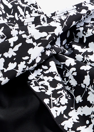 Maillot 1 pièce sculptant style croisé, maintien léger • noir-blanc floral • Boutique bonprix