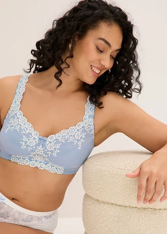 Tehermentesítő melltartó merevítő nélkül, kipárnázott vállpántokkal • púderkék-gyapjúfehér • bonprix áruház