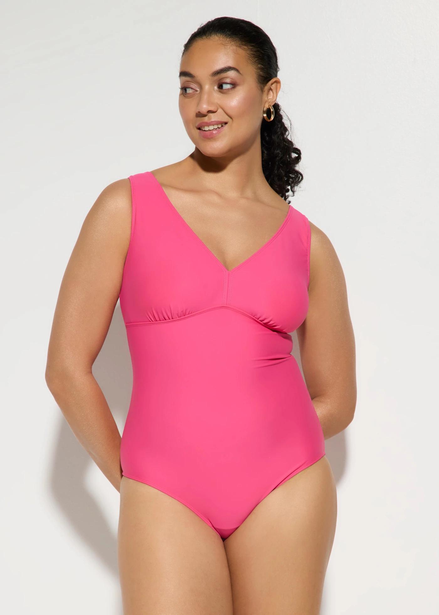 Medium corrigerend badpak met V-hals • pink • bonprix online shop