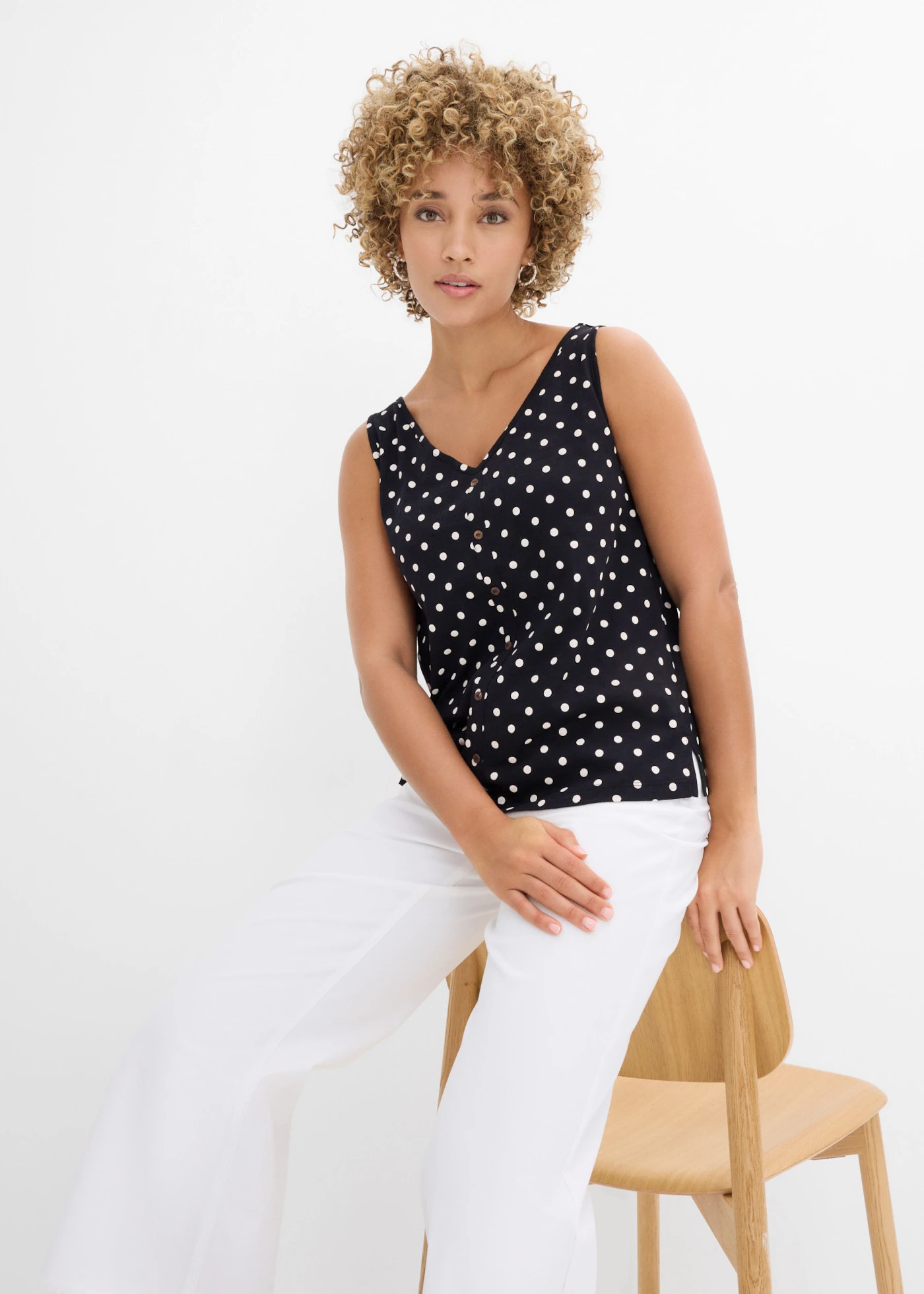 Top met knoopsluiting • zwart-wit gestippeld • bonprix online shop