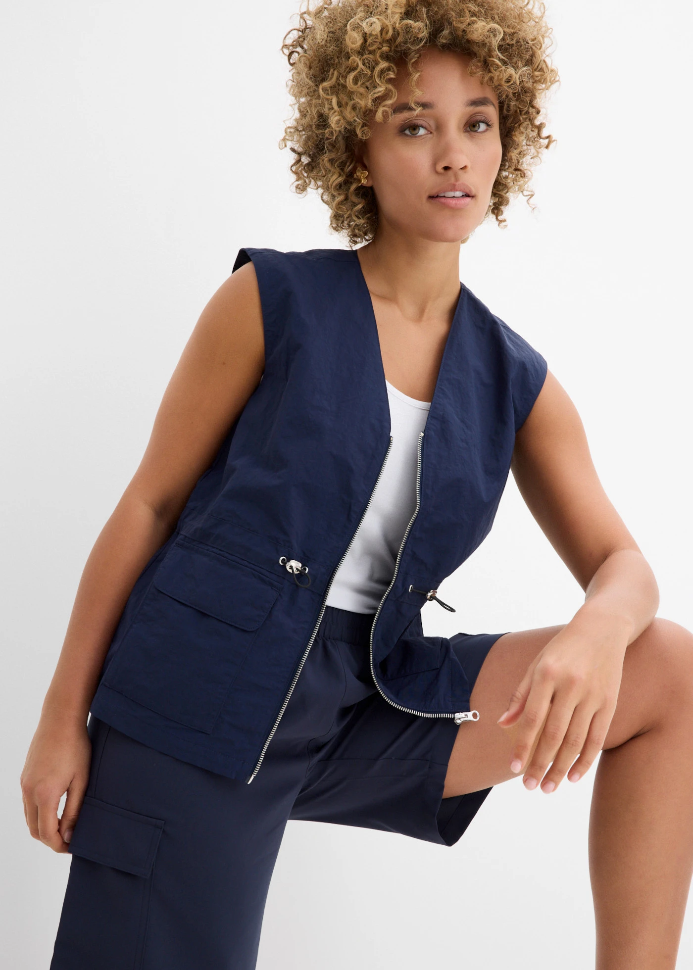 Bodywarmer met trekkoord • donkerblauw • product-page.page-title-suffix