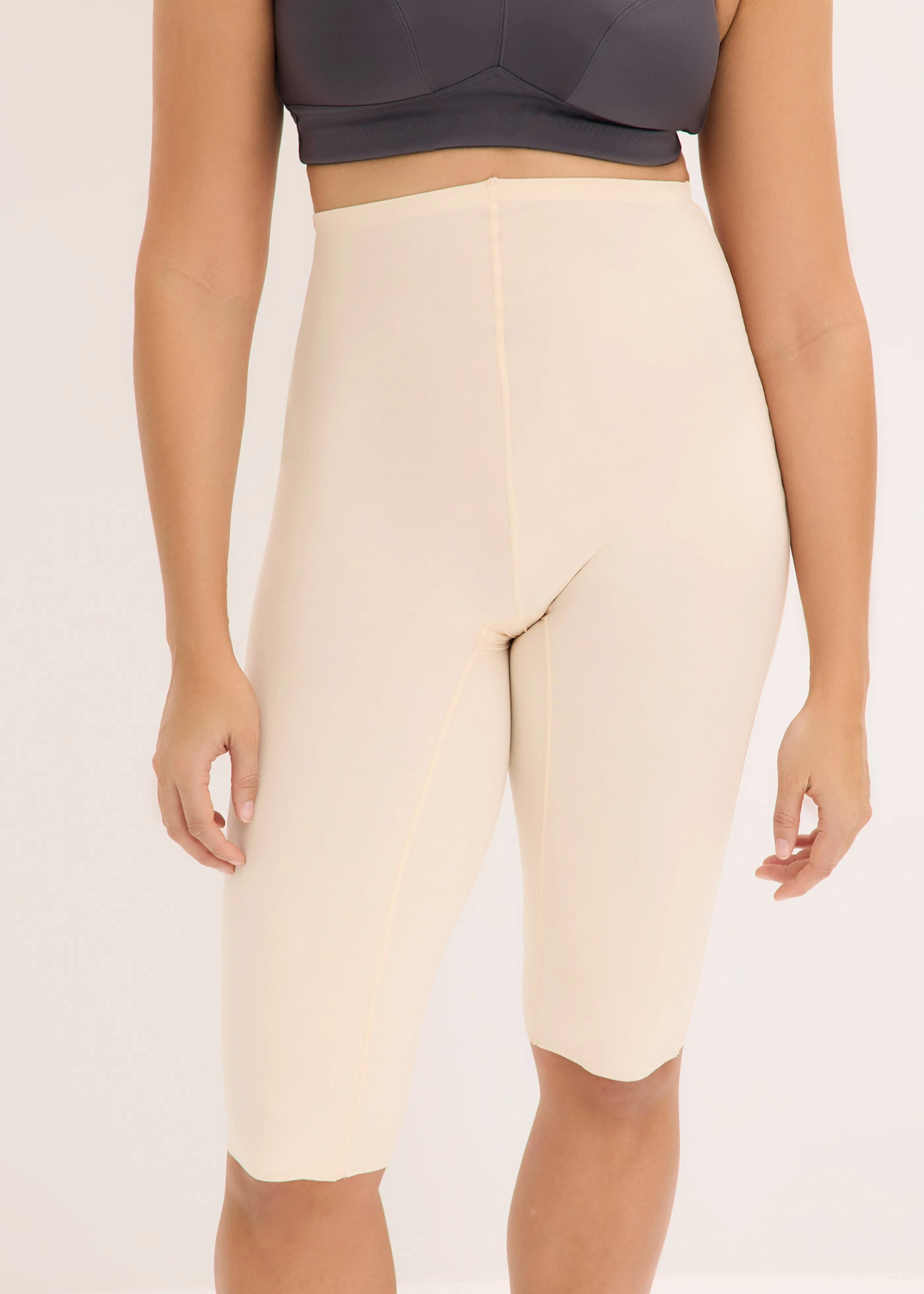 Spodnie capri lekko modelujące z bawełny • pudrowy • sklep bonprix