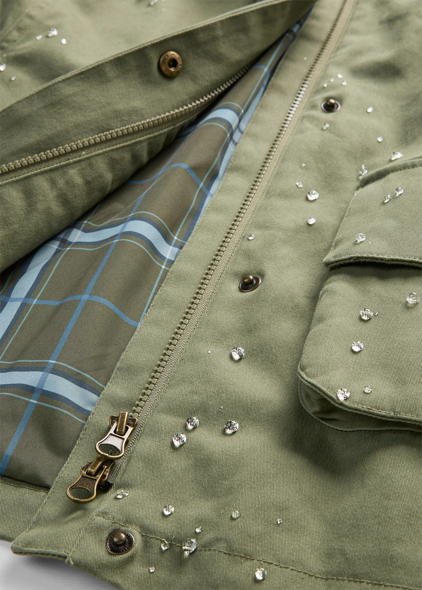 Veste déperlante avec doublure à carreaux • olive • Boutique bonprix