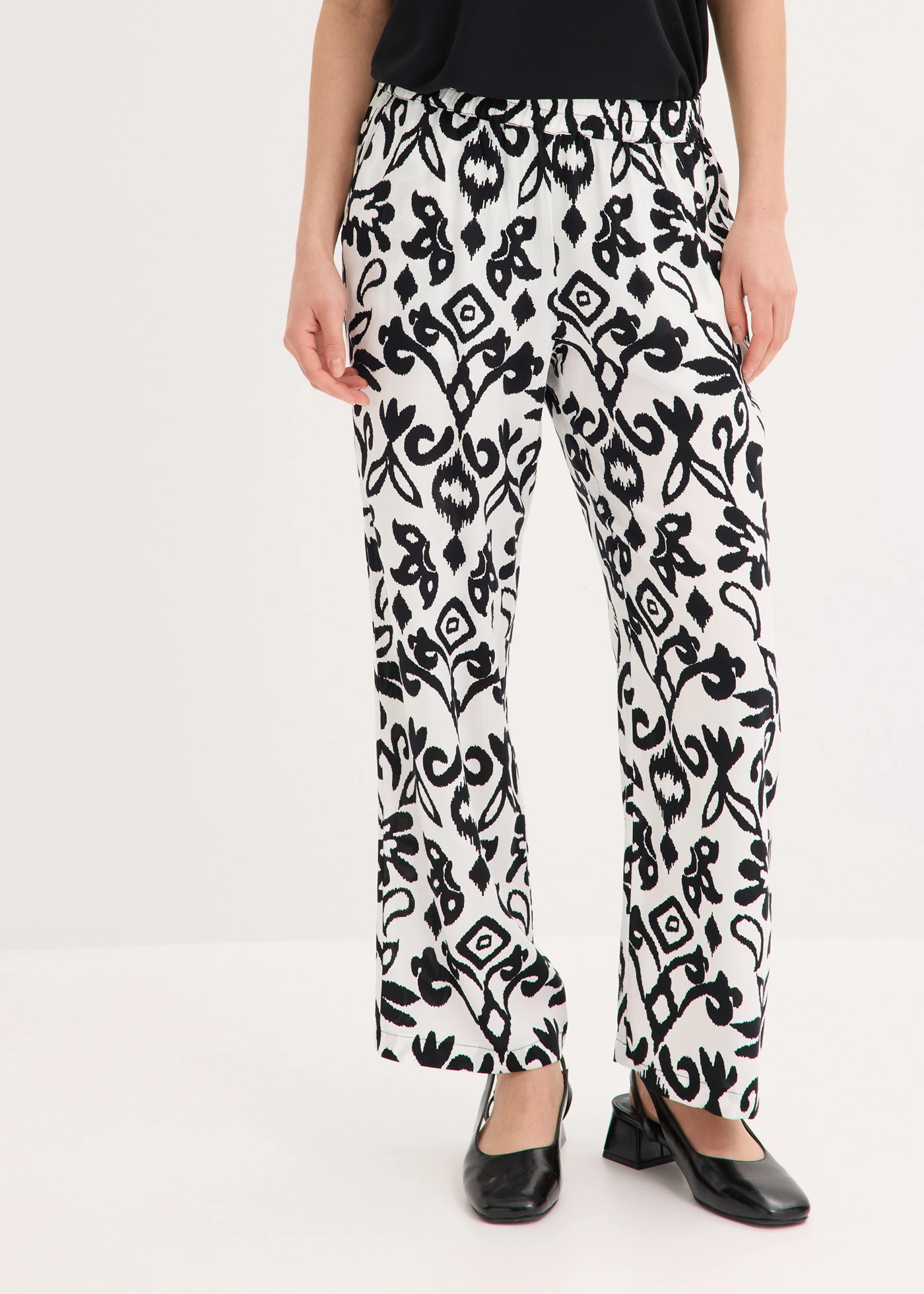 Pantalon large en viscose fluide • écru-noir imprimé • Boutique bonprix