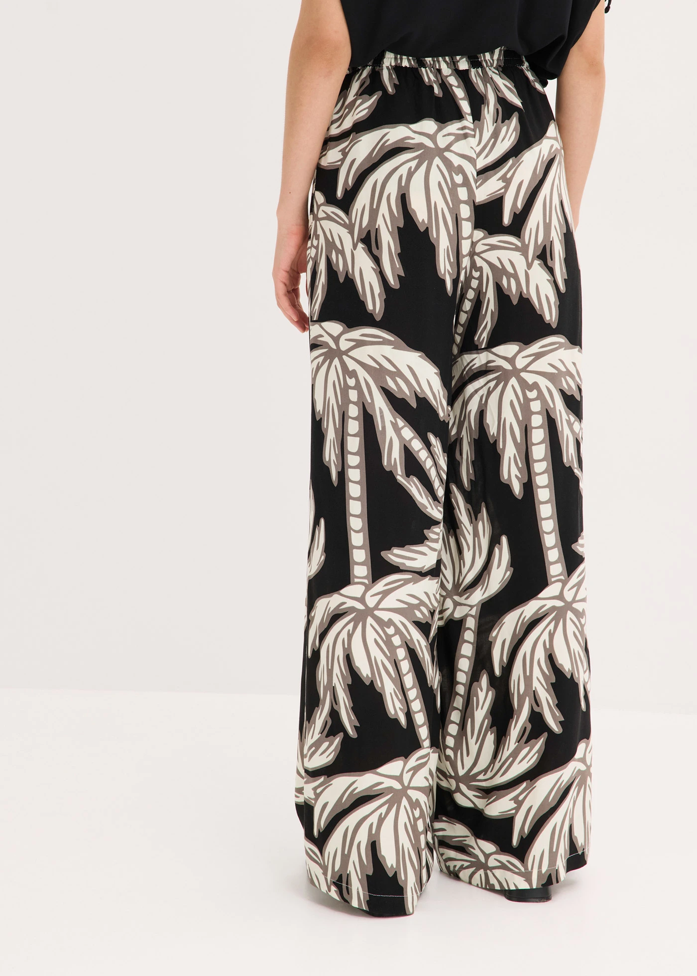 Pantalon large en viscose fluide • noir-blanc floral • Boutique bonprix