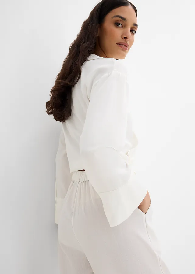 Broek met decoratieve knoop van een viscose-mix • wolwit • product-page.page-title-suffix