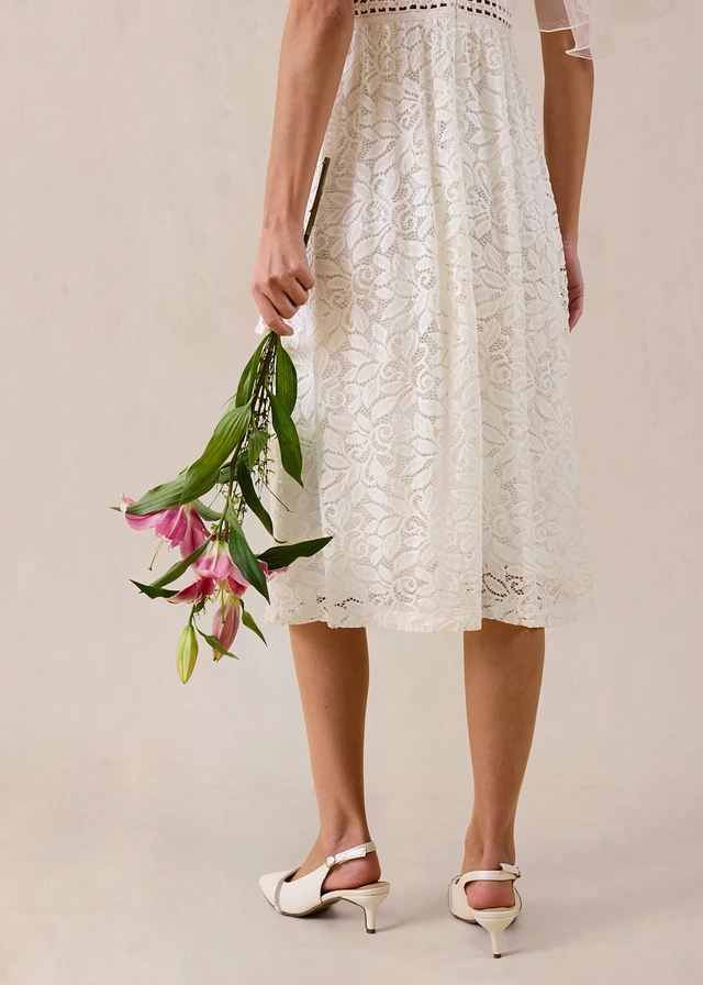 Jersey jurk met gehaakt inzetstuk in de taille • wolwit • product-page.page-title-suffix