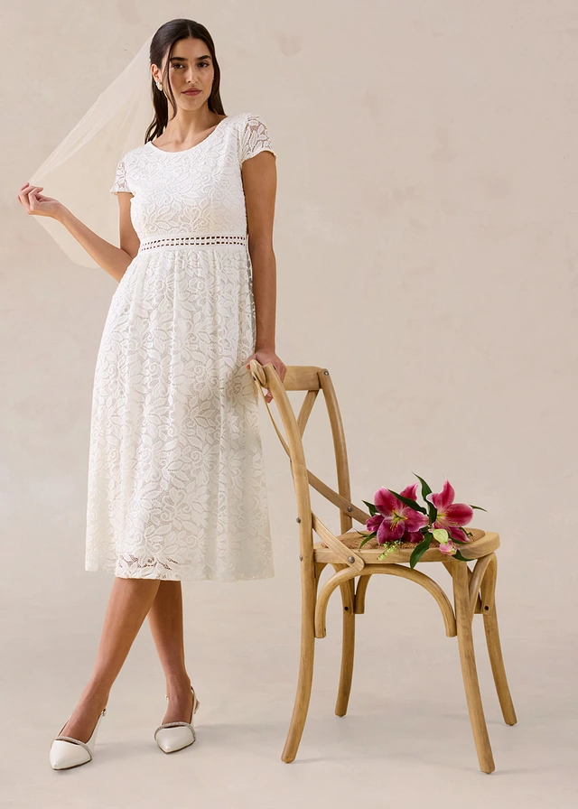 Jersey jurk met gehaakt inzetstuk in de taille • wolwit • product-page.page-title-suffix
