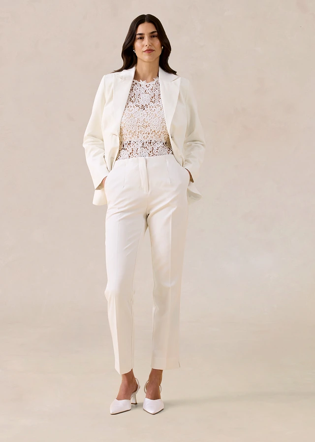 Blejzer s ozdobnými gombičkami biela vlna