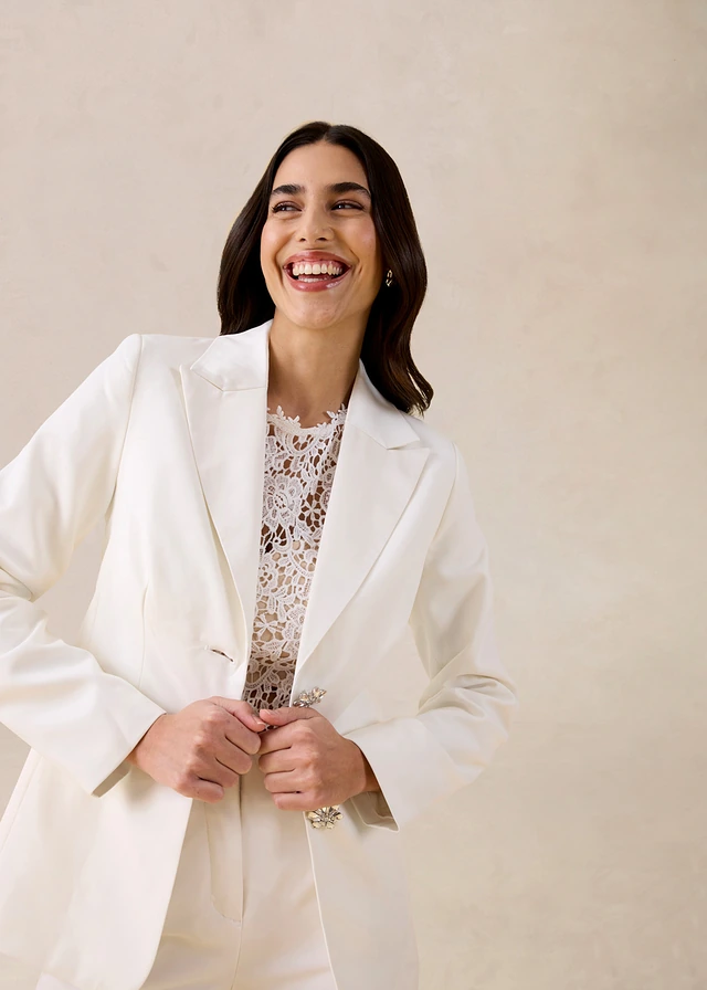 Blazer met sierknopen • wolwit • product-page.page-title-suffix