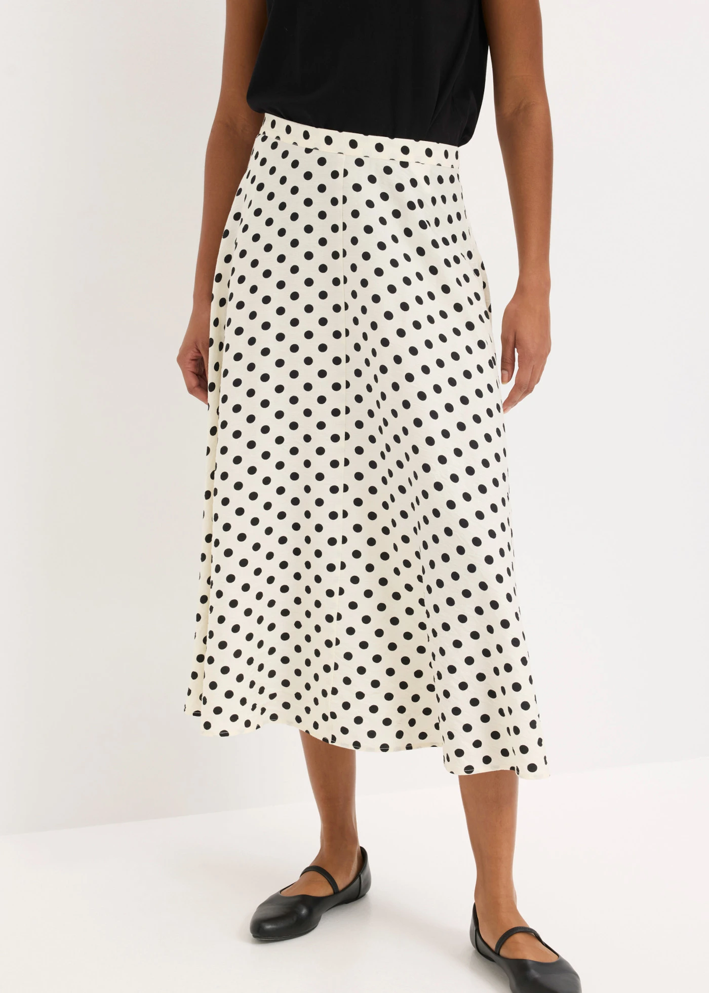 Midi rok van een soepele viscosemix • wit/zwart gestippeld • bonprix online shop