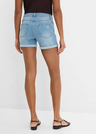 Farmer rövidnadrág Mid Waist, szaggatott részletekkel • világoskék denim, használt hatású • bonprix áruház
