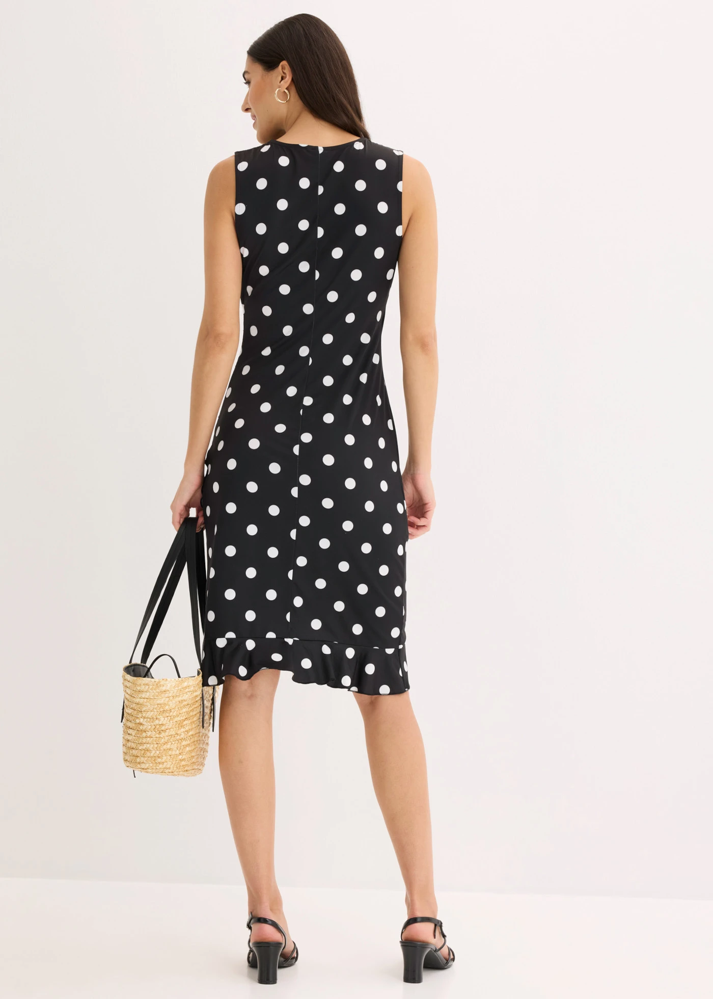 Jersey jurk met diep decolleté • zwart-wit gestippeld • bonprix online shop