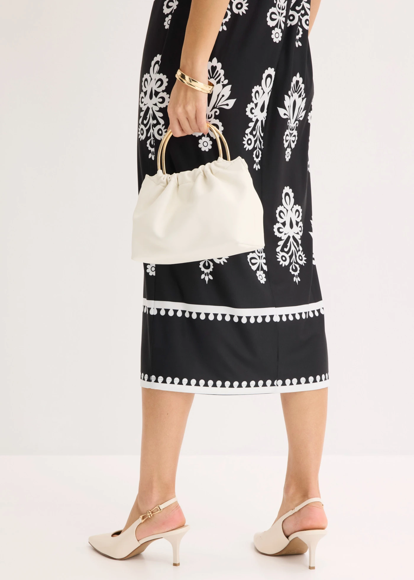 Robe en jersey à décolleté plongeant • noir-blanc imprimé • Boutique bonprix