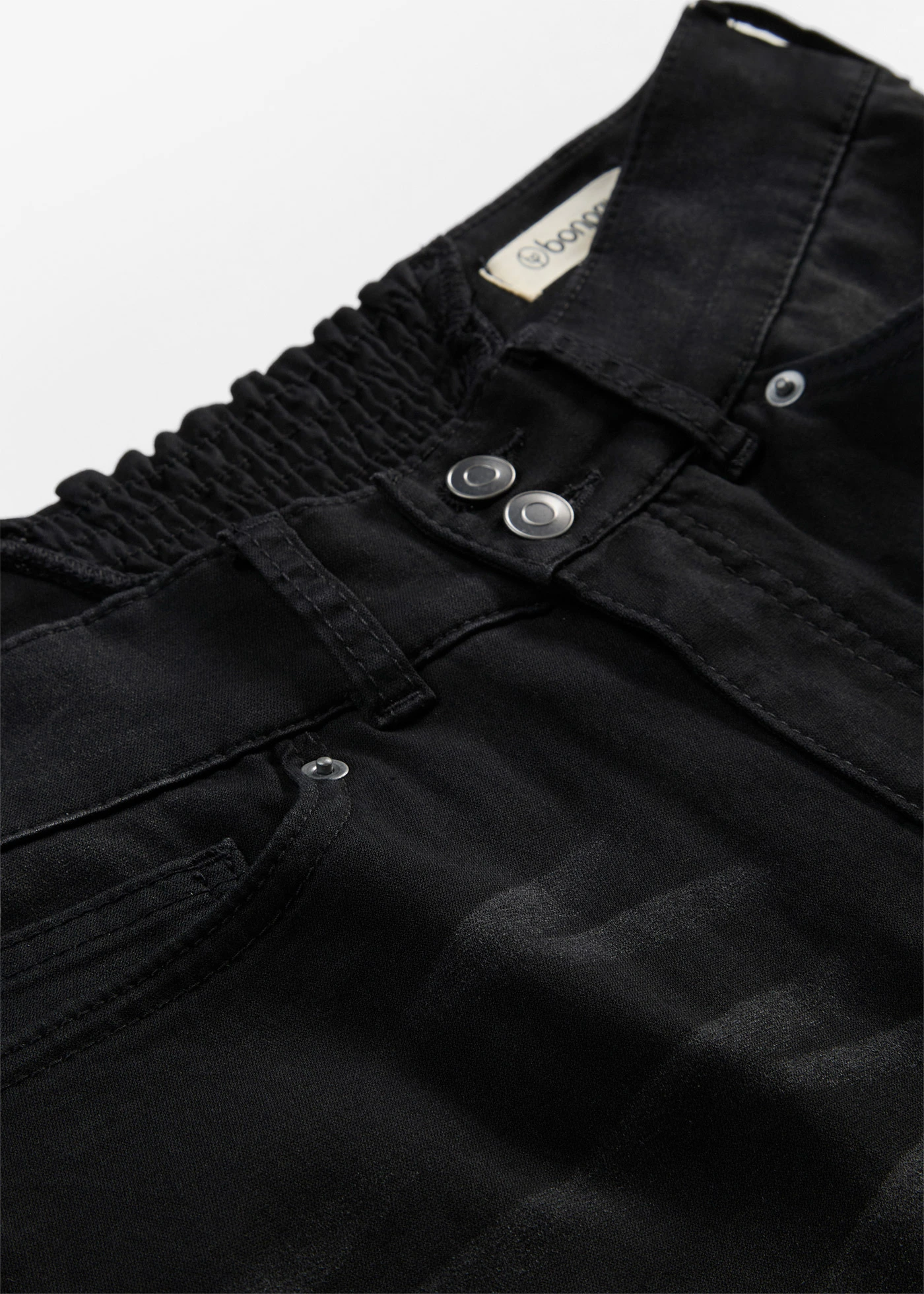 Modelujące dżinsy o kroju bootcut, mid waist • czarny denim • sklep bonprix