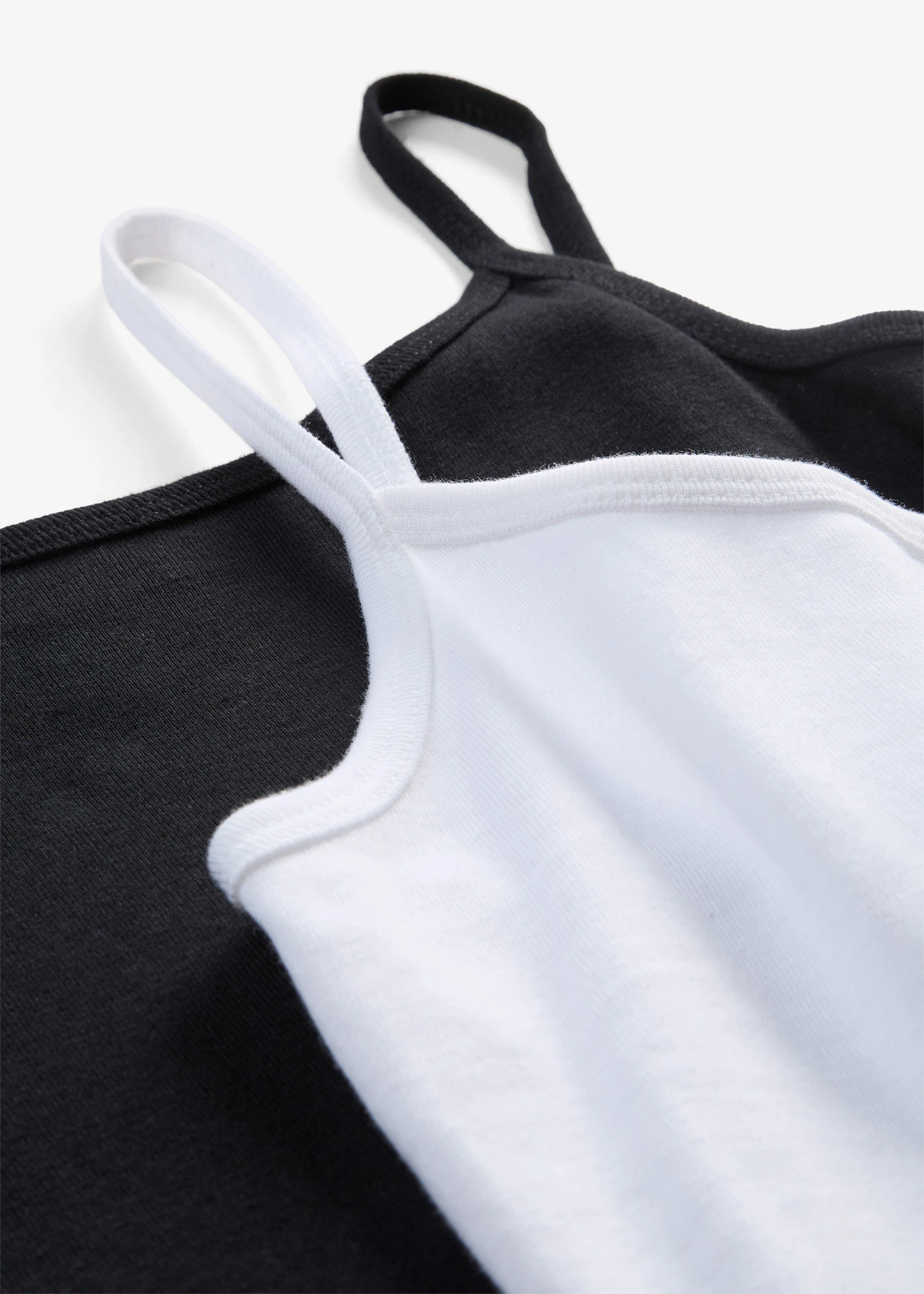 Lot de 2 tops à bretelles spaghetti • blanc/noir • Boutique bonprix
