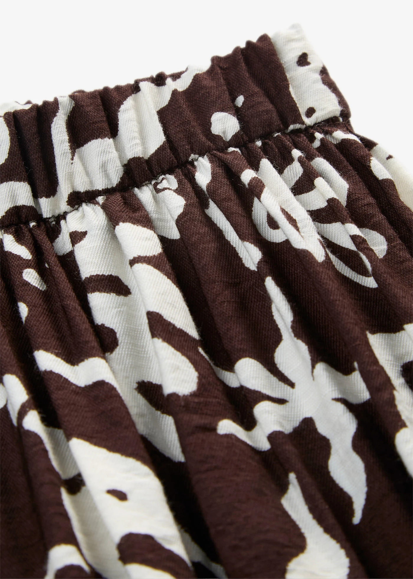Midi rok van een soepele viscosemix • donkerbruin-wolwit met print • product-page.page-title-suffix