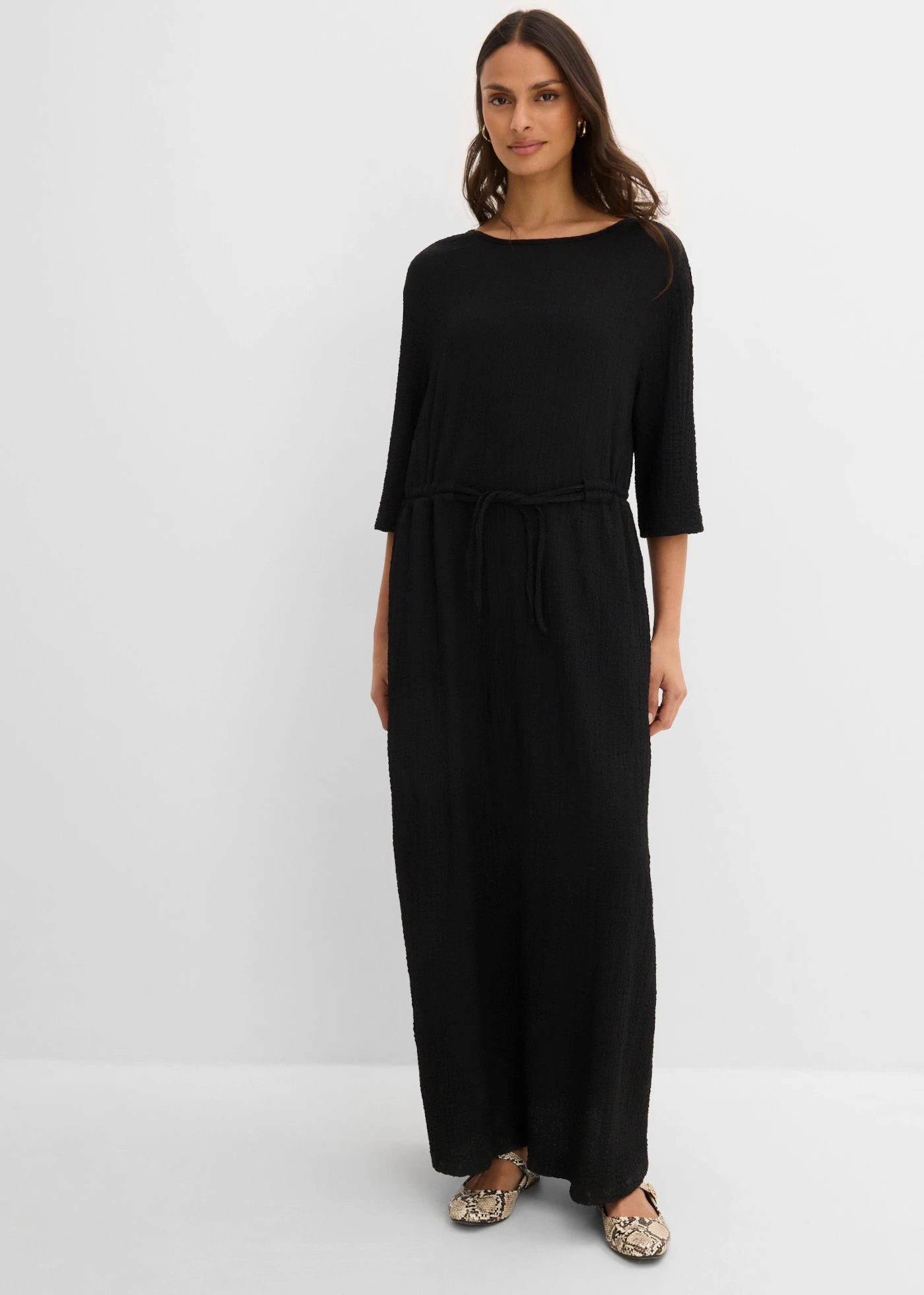 Robe midi en matière texturée • noir • product-page.page-title-suffix