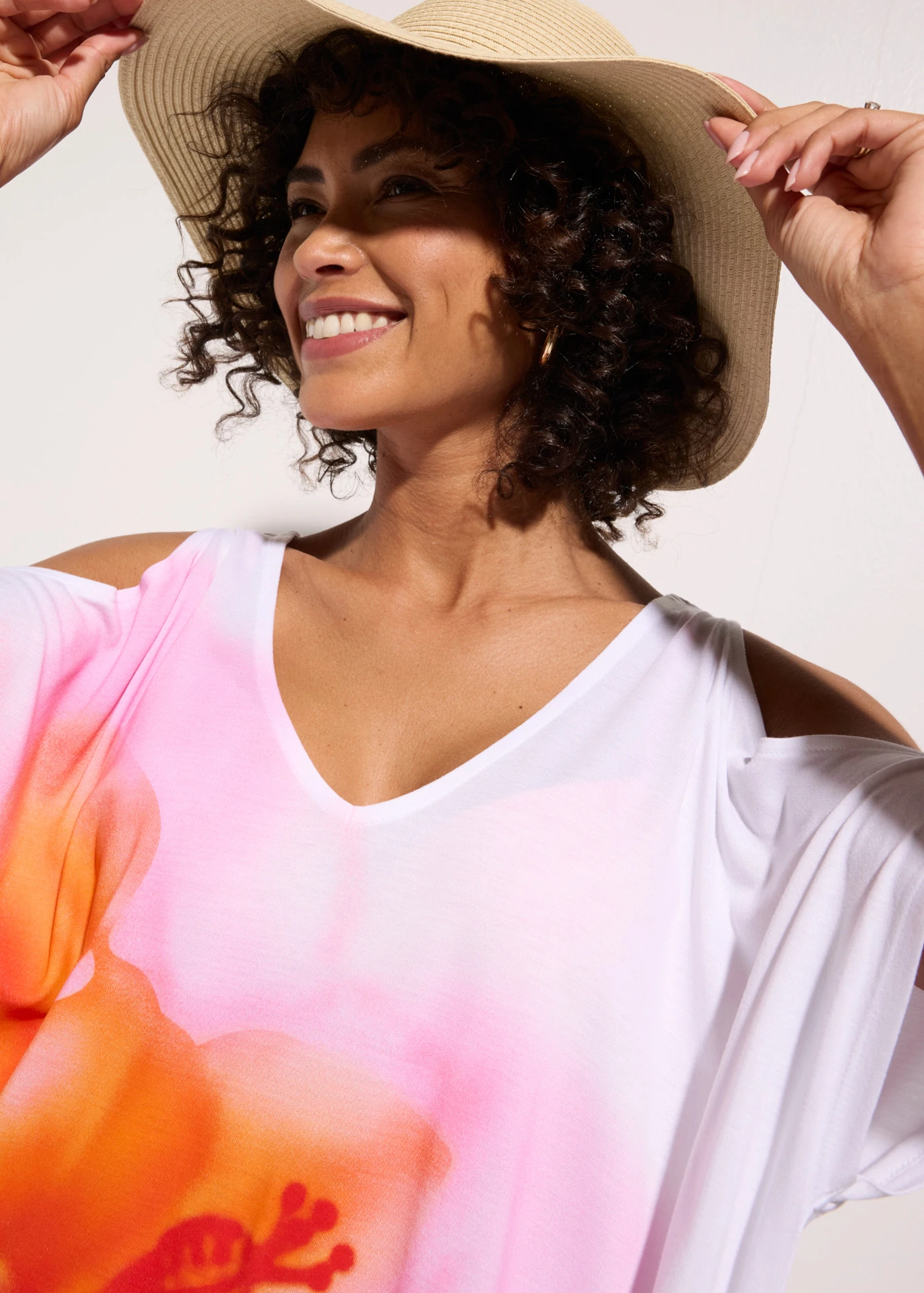 Robe de plage en viscose fluide • blanc-rose floral • Boutique bonprix