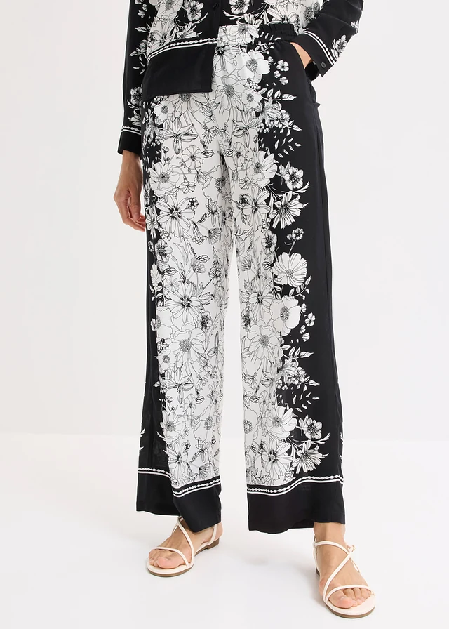 Pantaloni palazzo din viscoză fluidă • negru-ecru floral • magazin bonprix