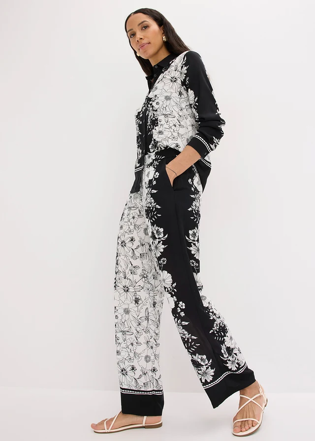 Pantaloni palazzo din viscoză fluidă • negru-ecru floral • magazin bonprix