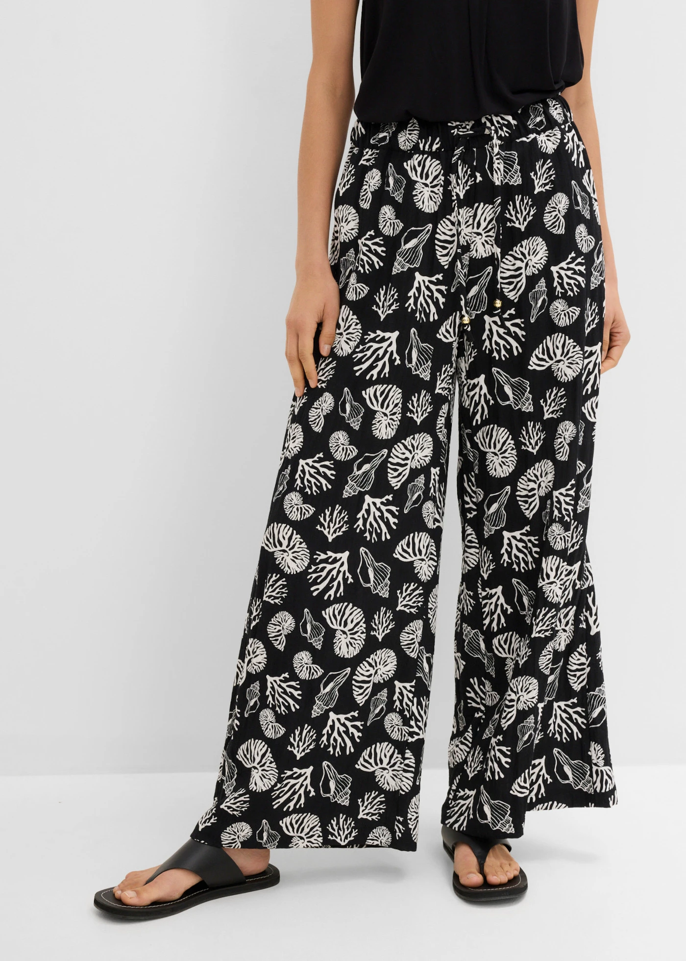Pantalon large à pinces en viscose mélangée • noir/écru imprimé • product-page.page-title-suffix