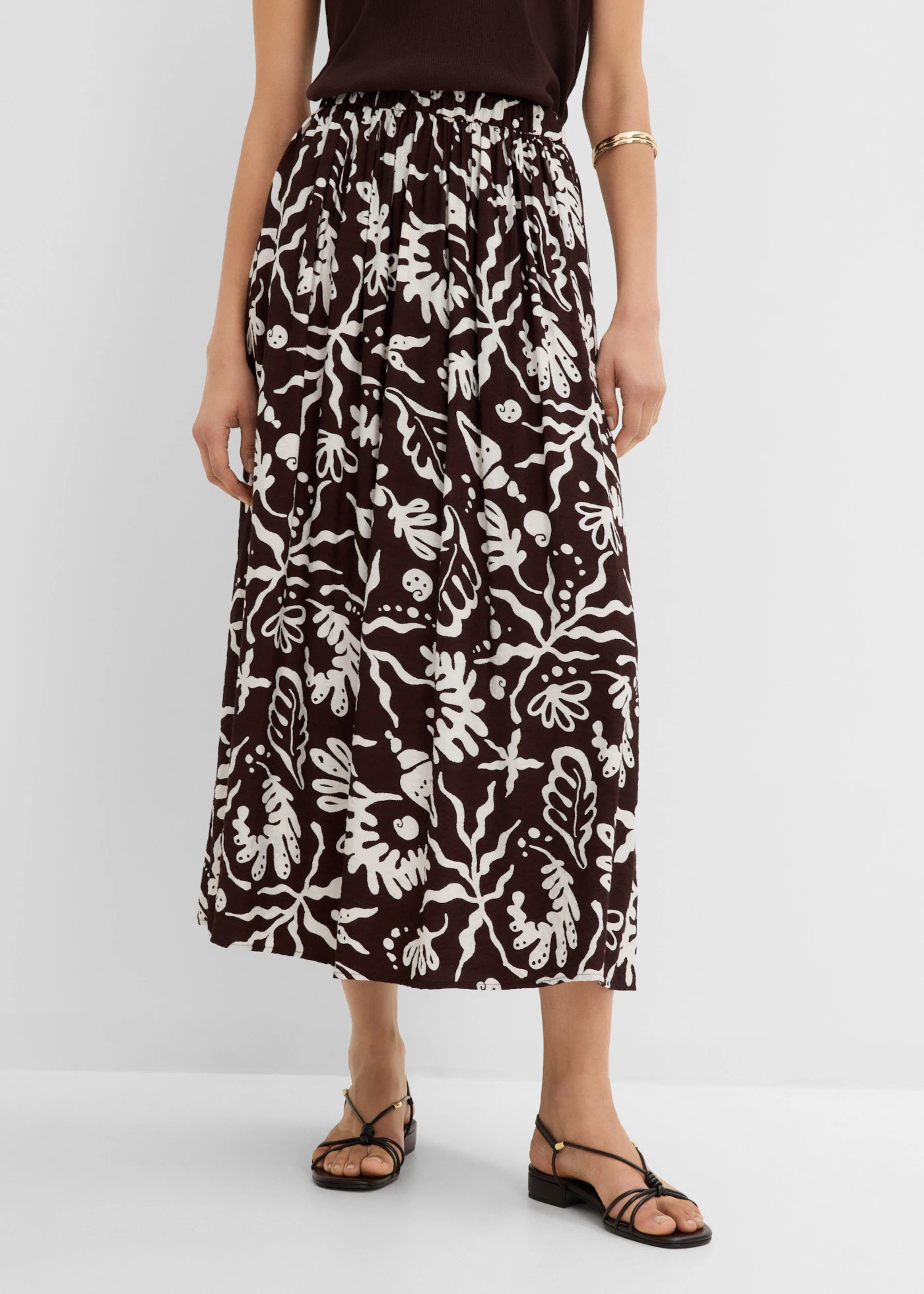 Jupe midi fluide • marron foncé-écru imprimé • product-page.page-title-suffix