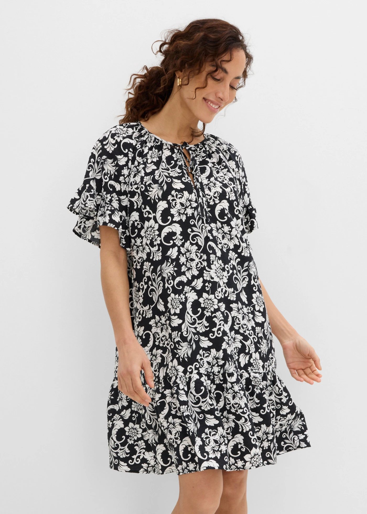 Rochie gen tunică din amestec moale de viscoză • negru-ecru cu imprimeu • magazin bonprix