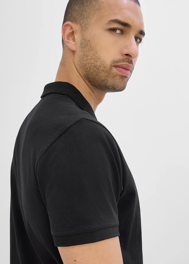 Piqué poloshirt van biologisch katoen • zwart/oranje • product-page.page-title-suffix