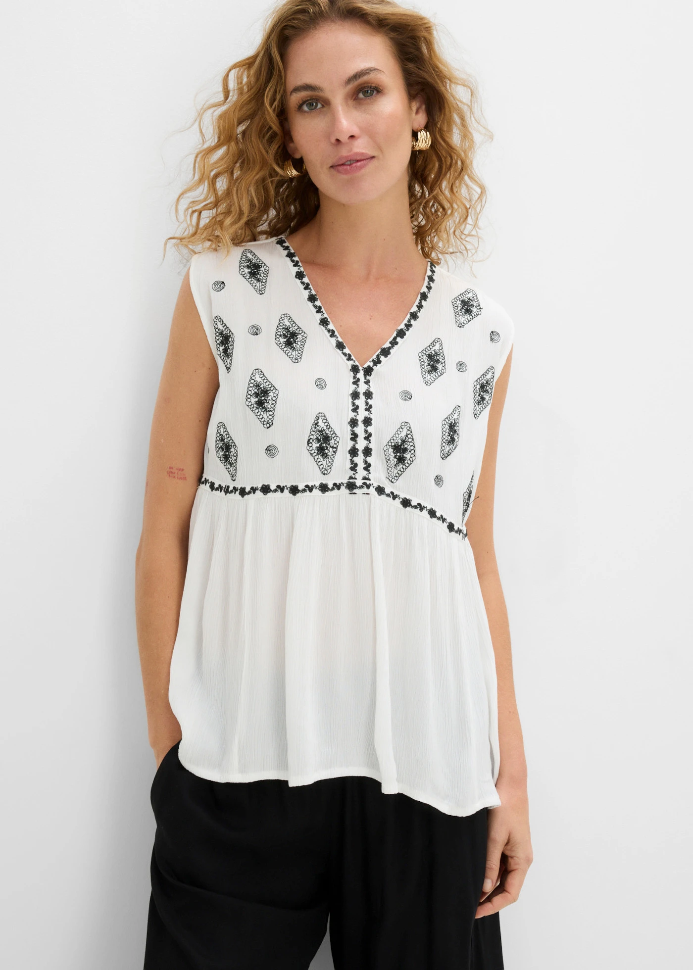 Blousetop van soepele viscose • wolwit-zwart • product-page.page-title-suffix