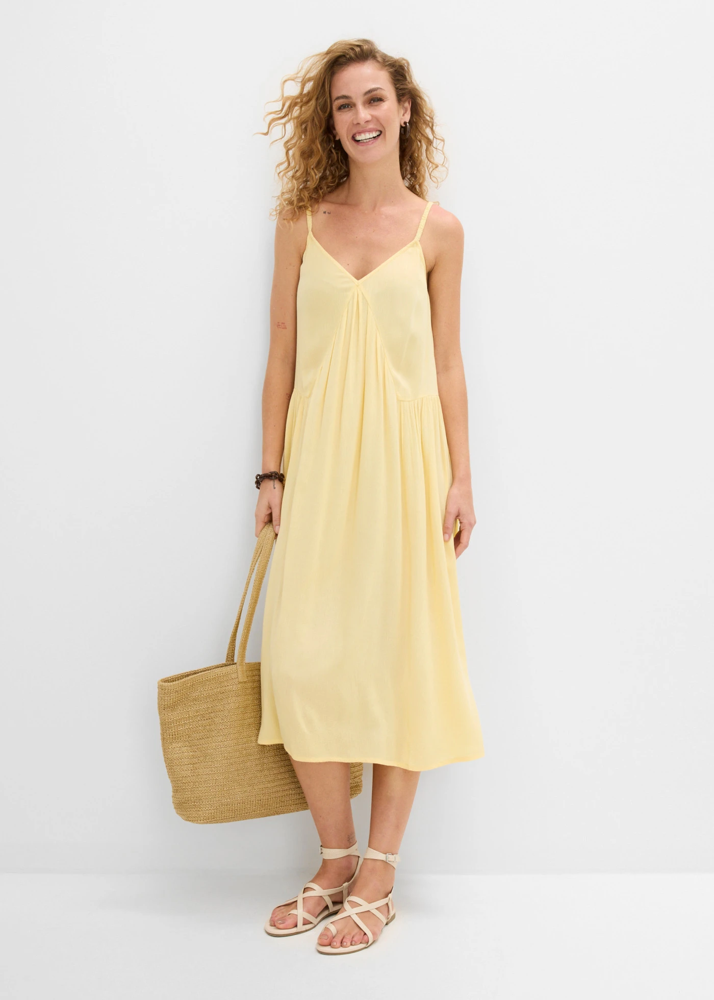 Rochie midi din viscoză texturată • galben pastel • magazin bonprix