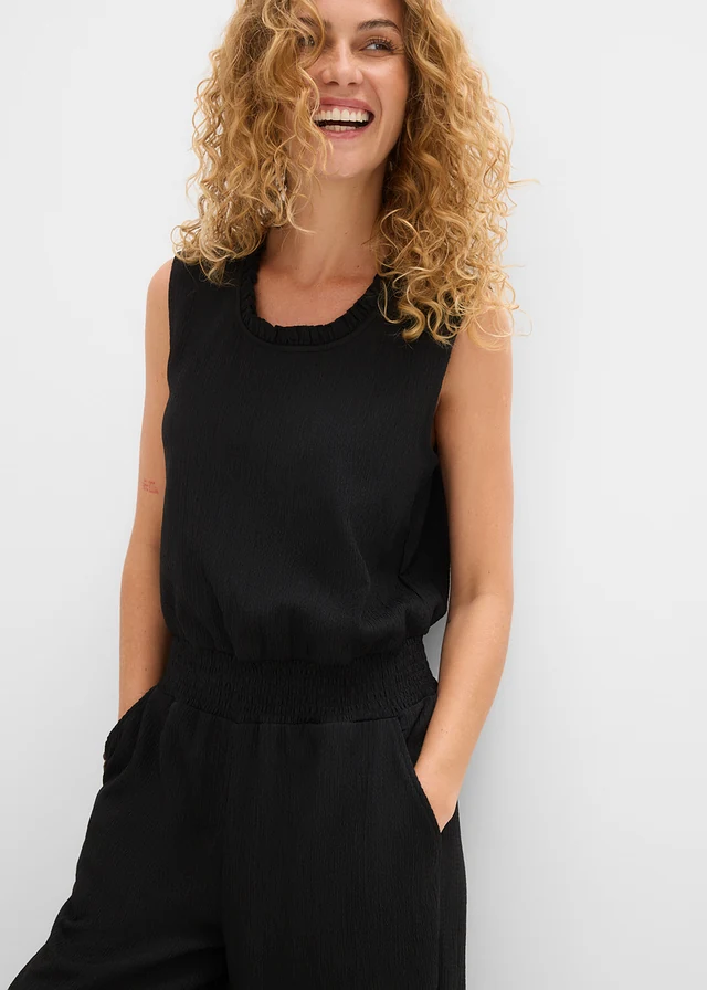 Jersey jumpsuit van gestructureerde crêpe • zwart • product-page.page-title-suffix