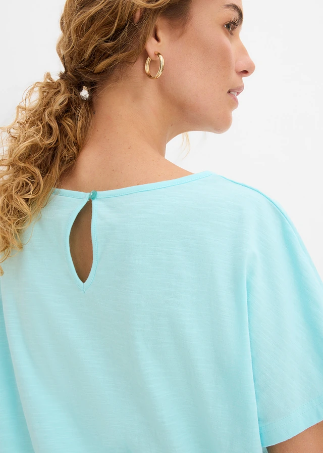 Bluză din fire cu flameuri din bumbac organic, cu bată încrețită • albastru/acvamarin • magazin bonprix