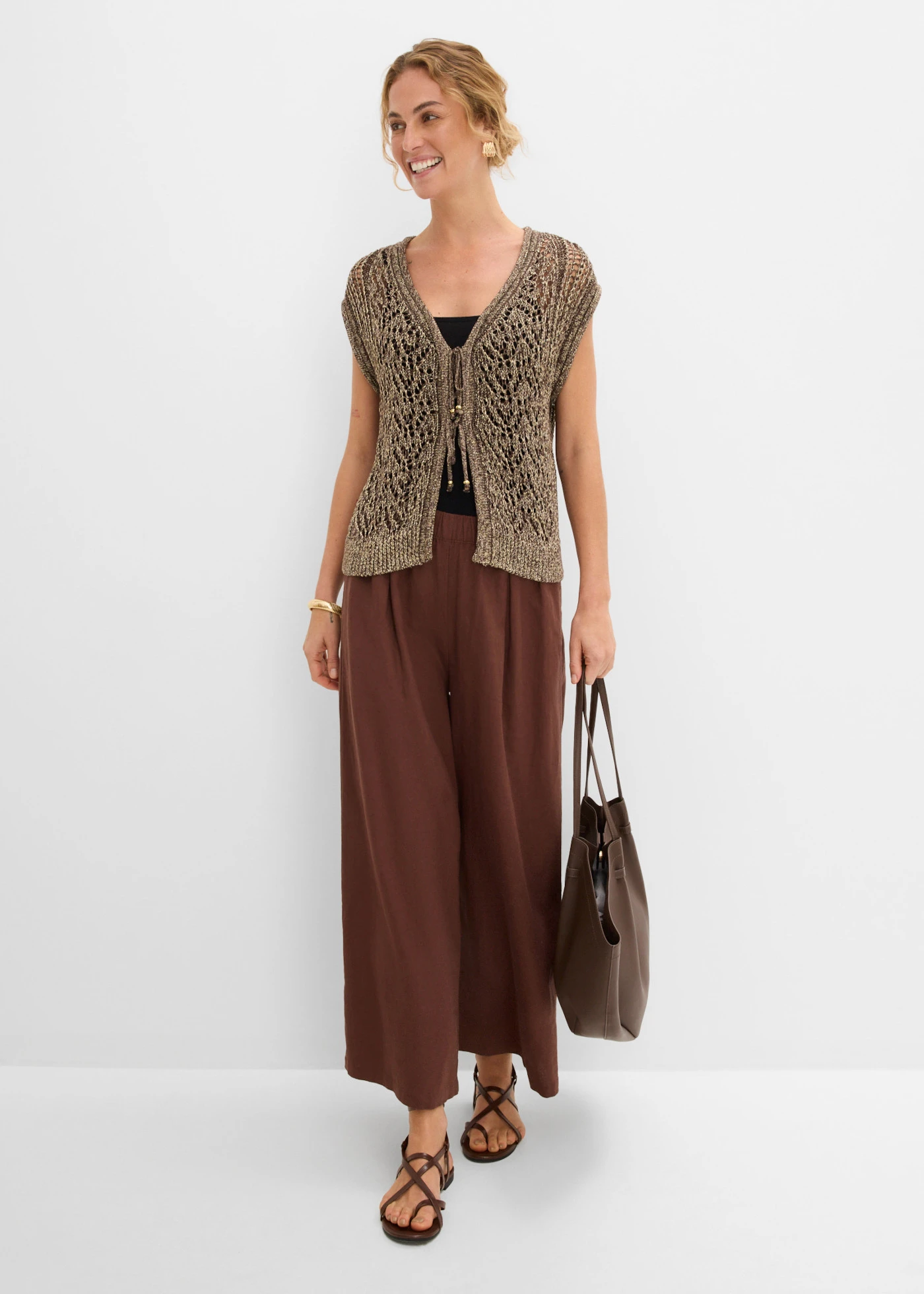 Gilet sans manches en maille ajourée et fil brillant • marron foncé/doré métallisé • product-page.page-title-suffix