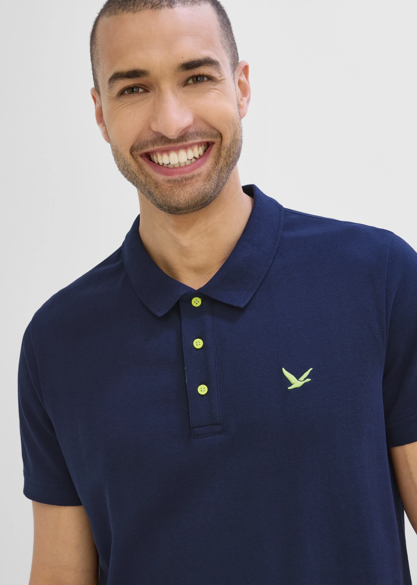 Bluză polo piqué din bumbac organic 100% • bleumarin/galben-neon • magazin bonprix