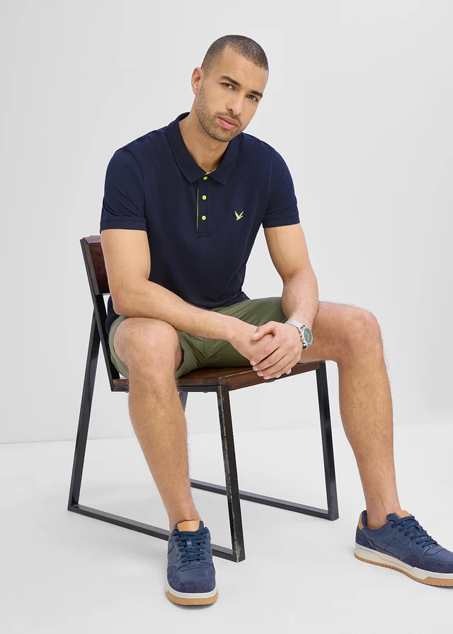 Piqué poloshirt van biologisch katoen • donkerblauw-neongeel • product-page.page-title-suffix