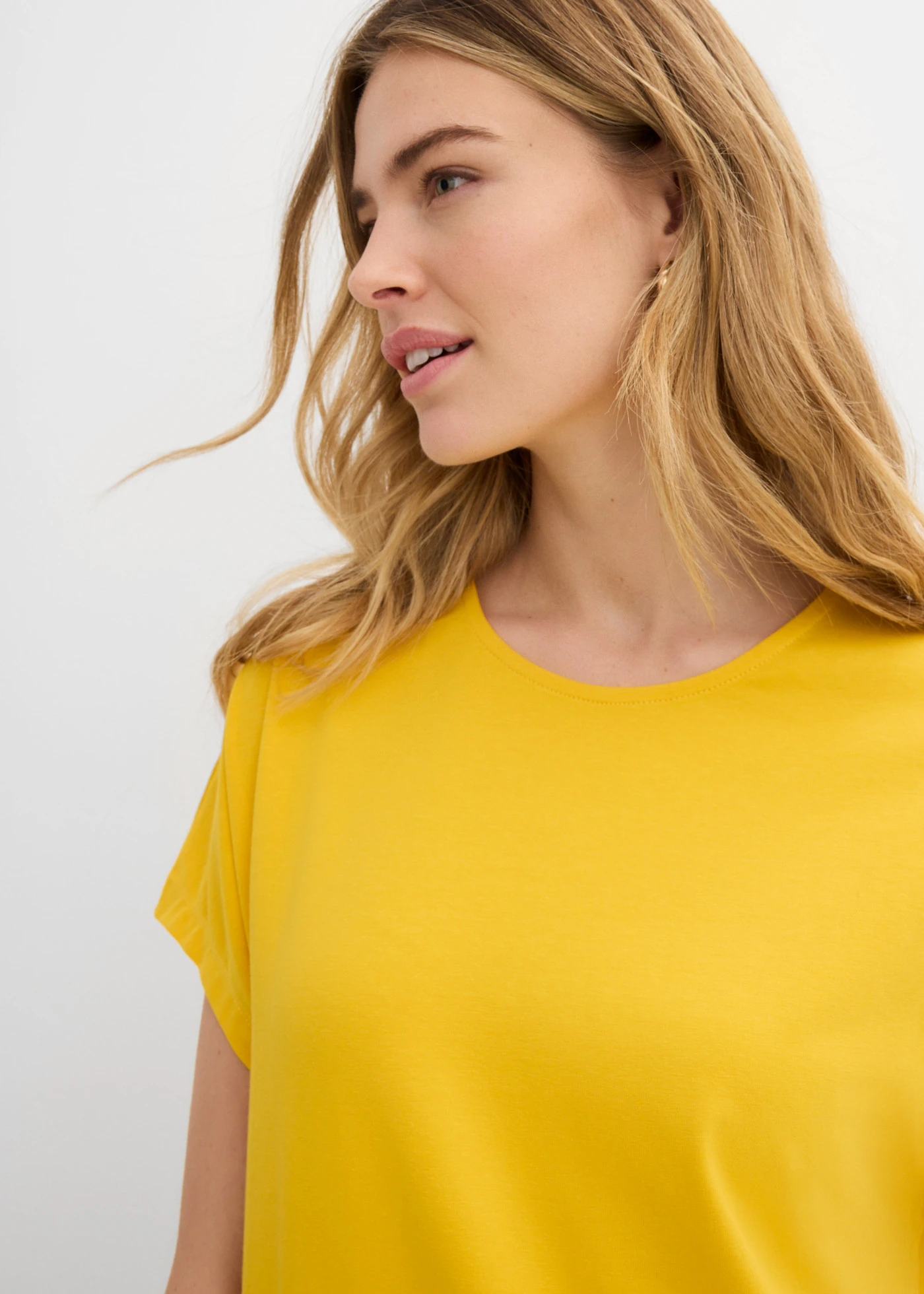 Jersey jurk met zakken • saffraangeel • bonprix online shop