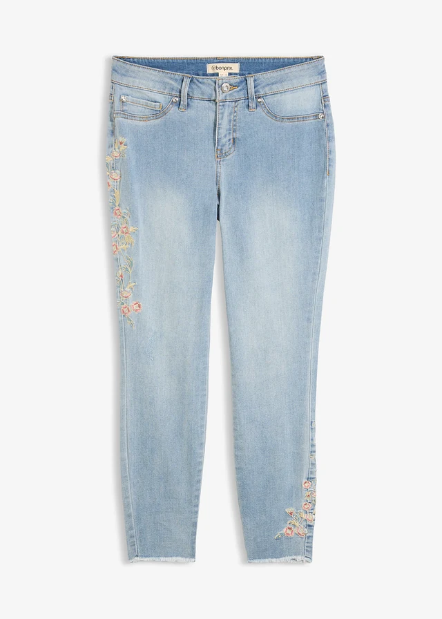 Jeansy skinny, średni stan, cropped • jasnoniebieski denim w kwiaty • sklep bonprix