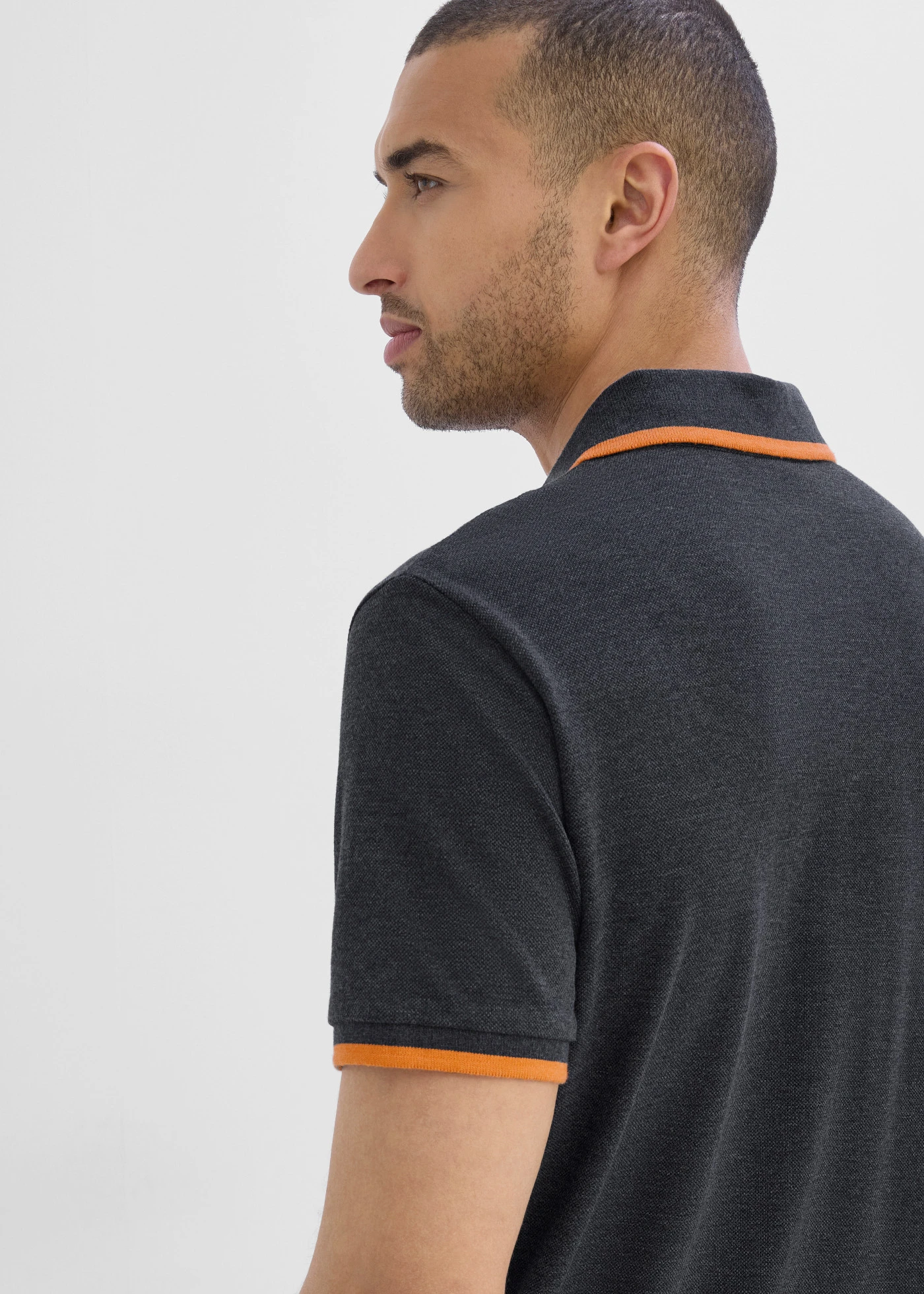 Bluză polo cu bumbac organic piqué • negru melanj • magazin bonprix